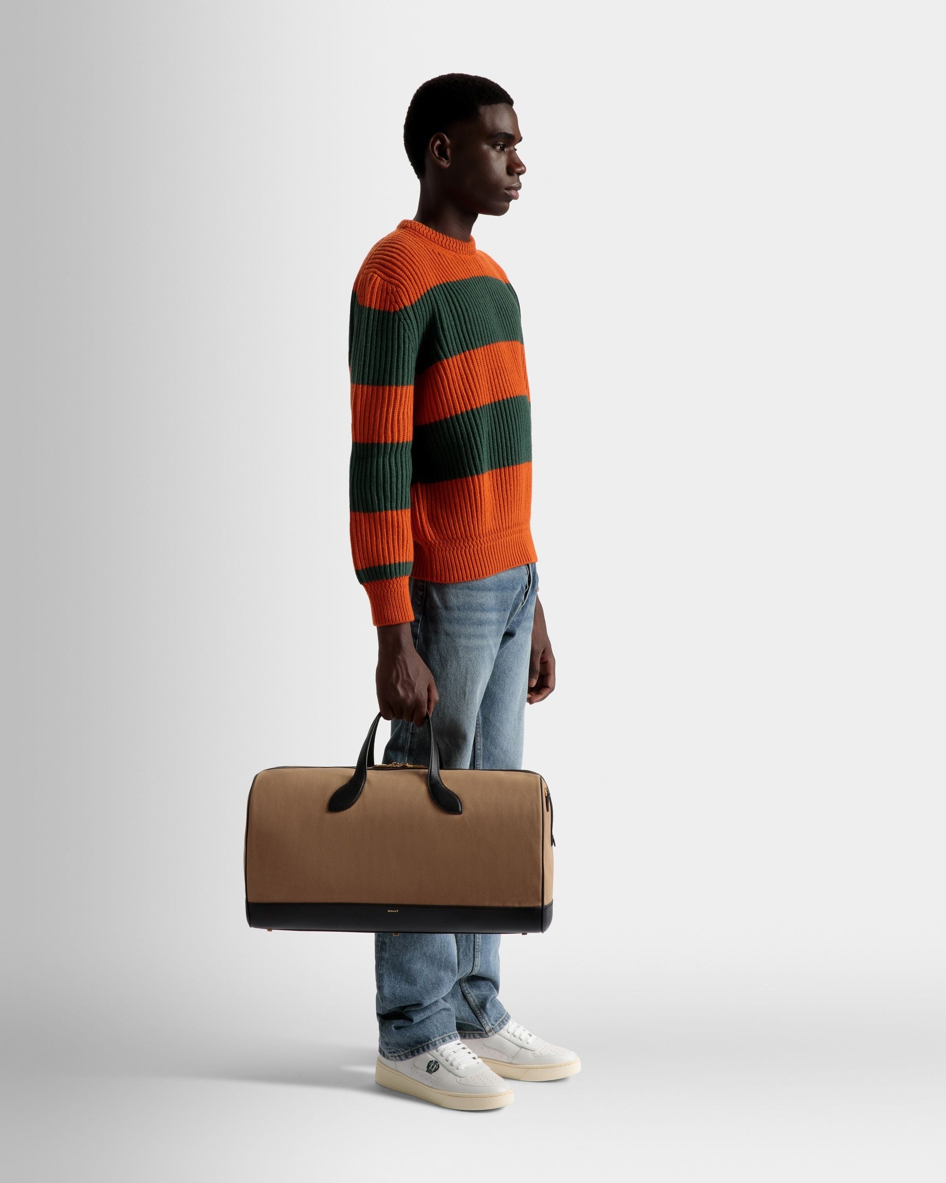 36 Hours | Men's Travel Bag | Sand And Black Fabric And Leather | Bally | On Model Front