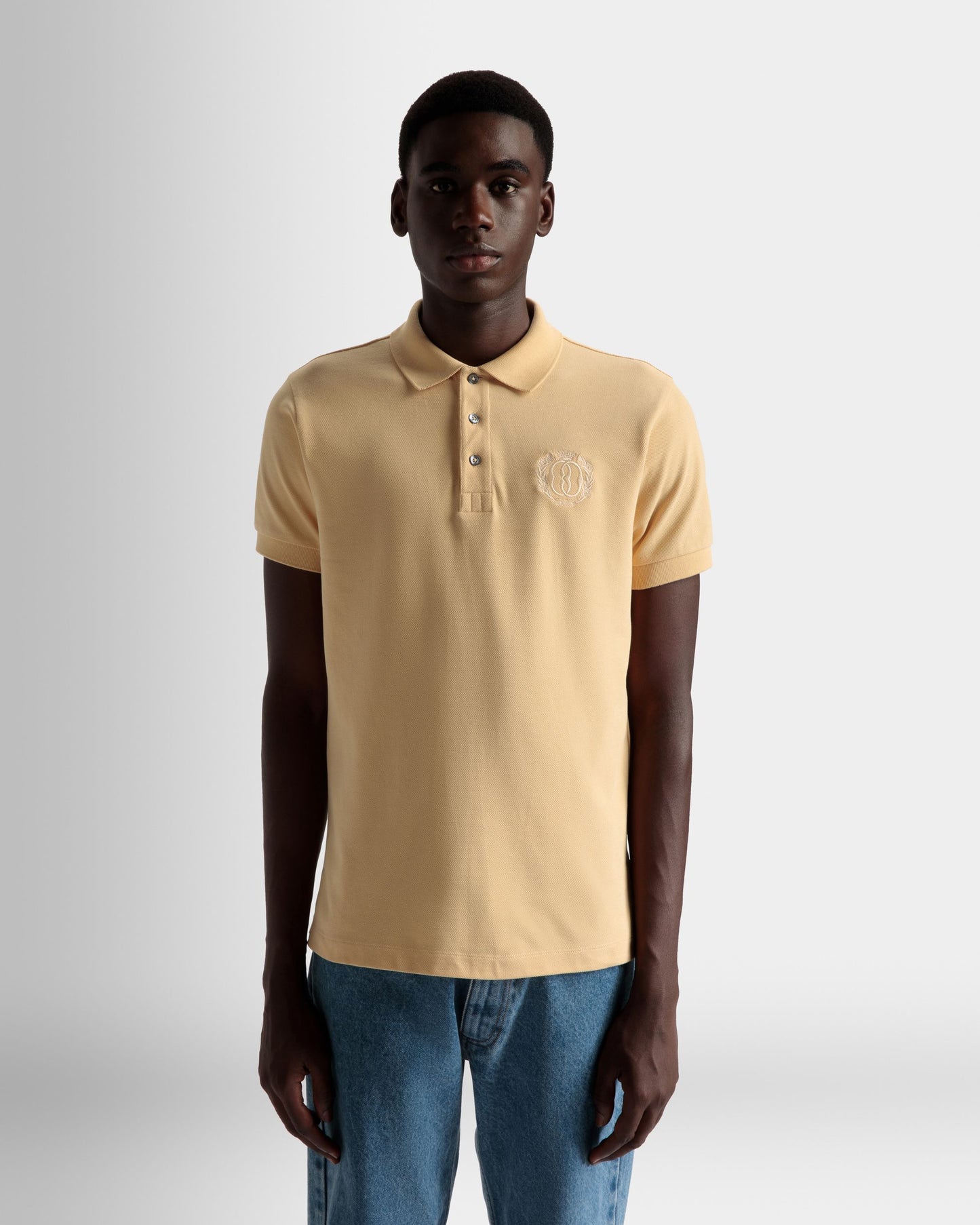Emblem Polo | Men's Polo | Cream Cotton | Bally | On Model Close Up