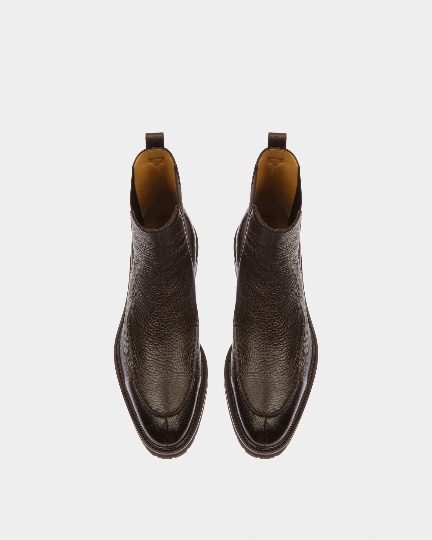 Mirno Leather Booties In Ebony Brown