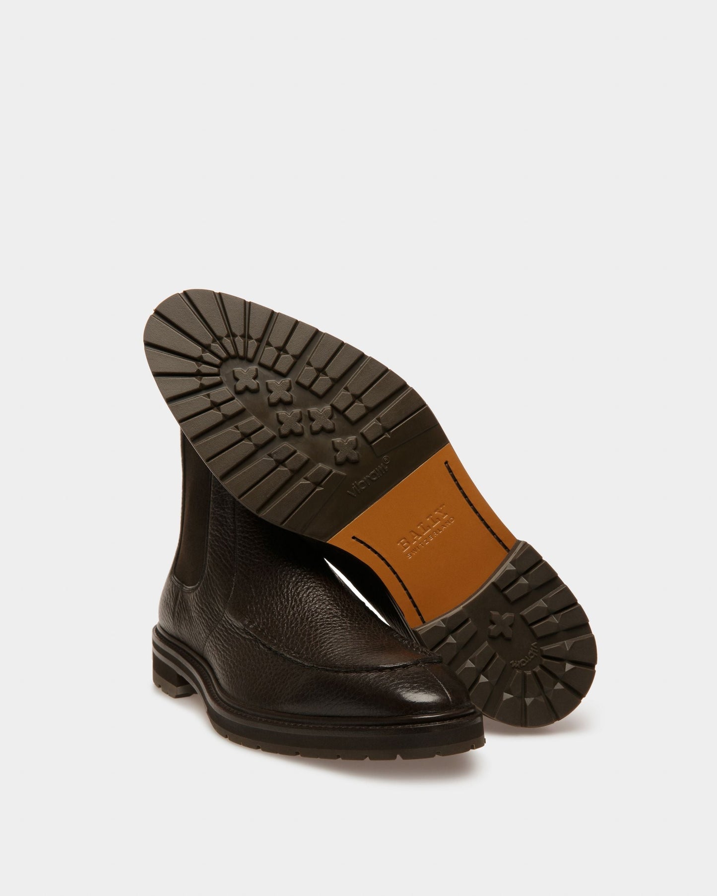 Mirno Leather Booties In Ebony Brown