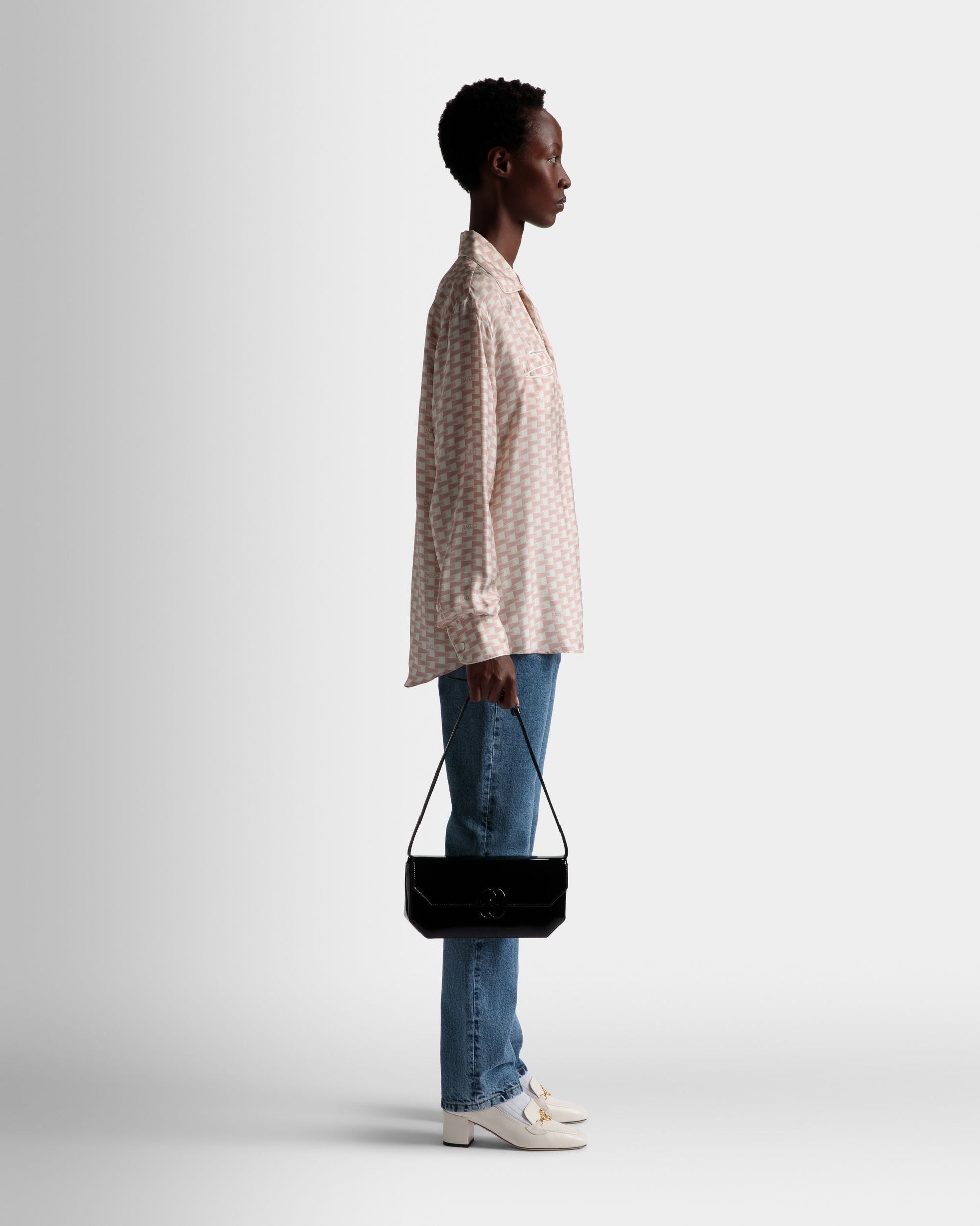 Emblem Folio | Women's Shoulder Bag | Black Leather | Bally | On Model Front
