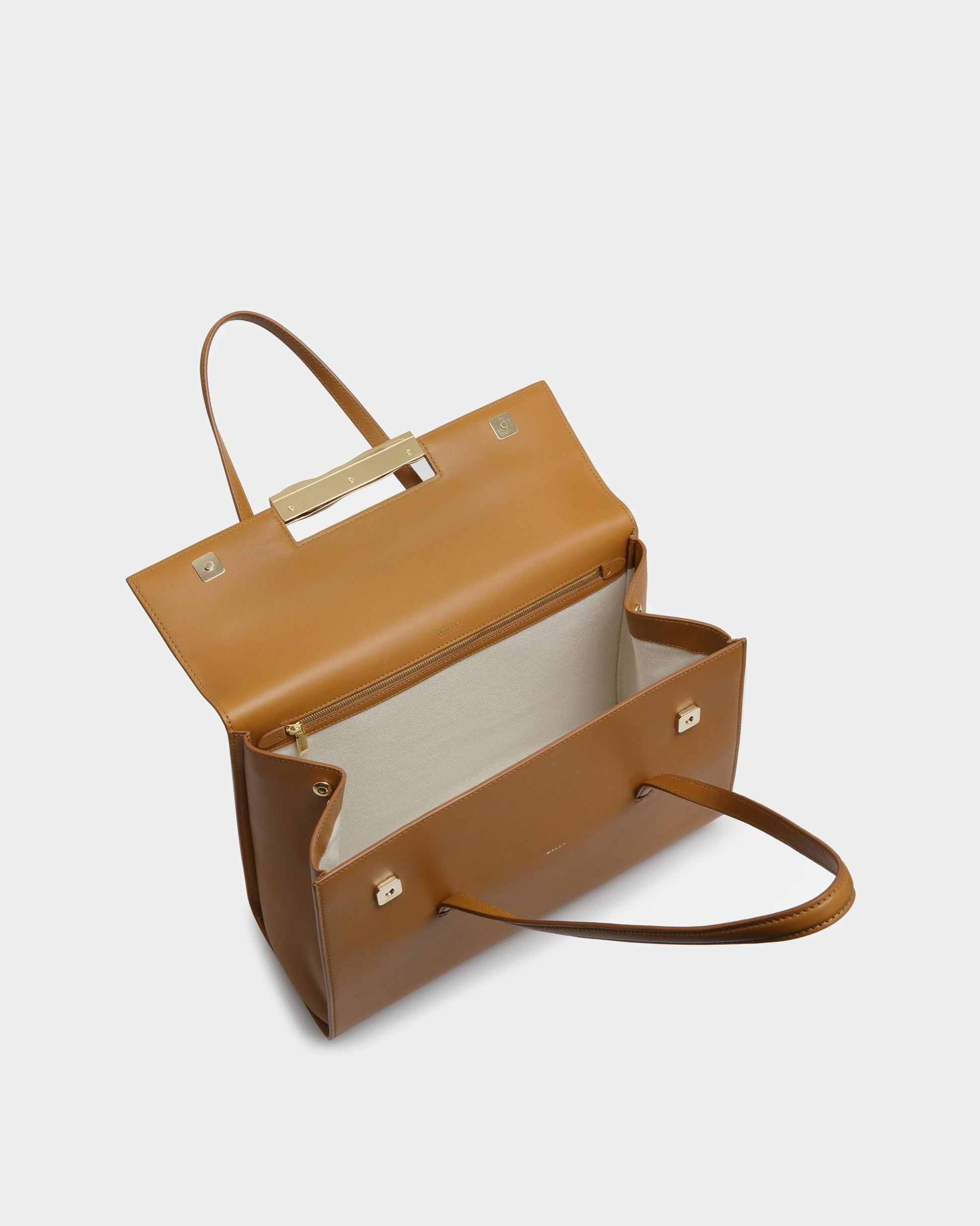 Baroque Fold | Women's Shoulder Bag | Desert Leather | Bally | Still Life Open / Inside