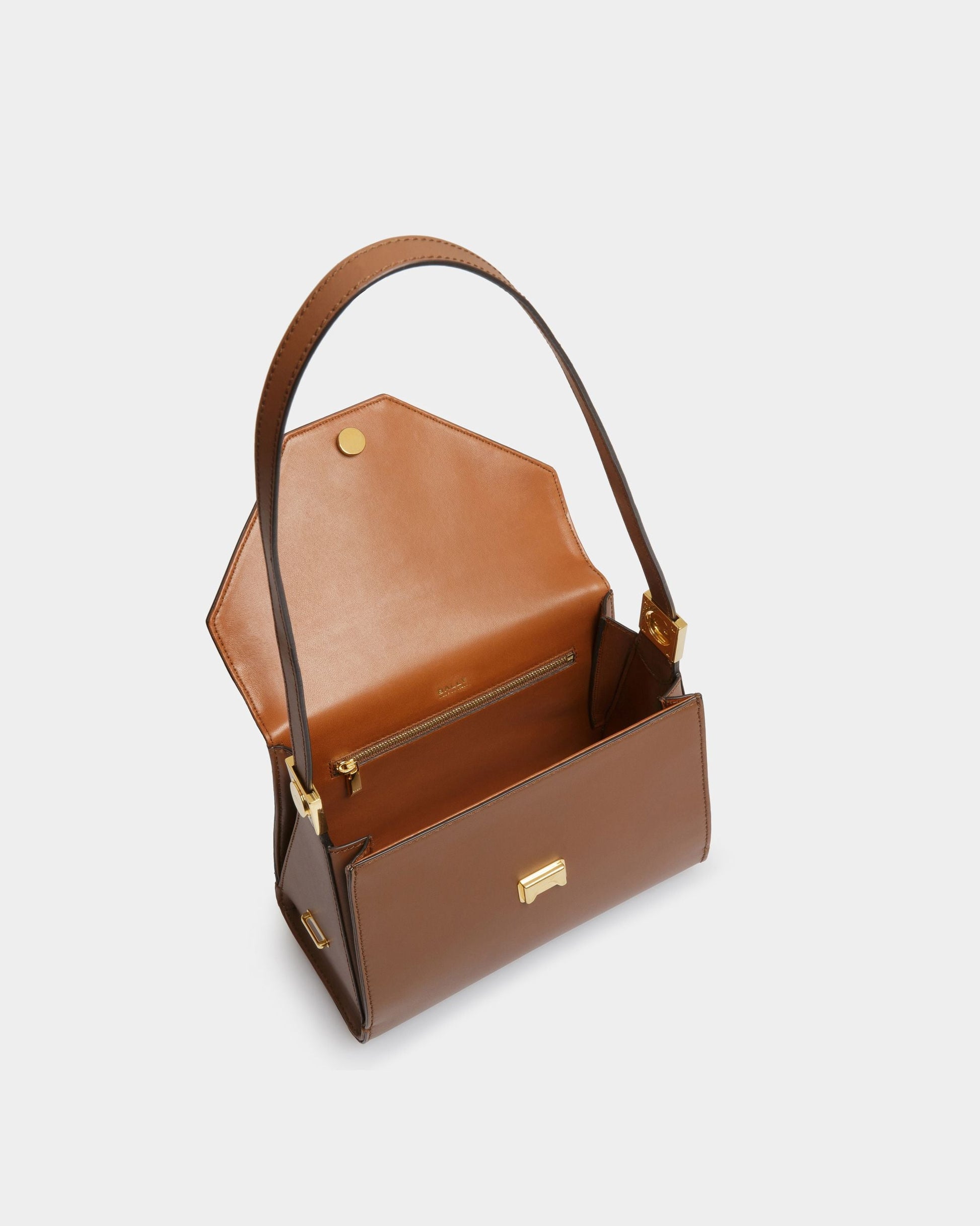 Emblem Trapeze | Women's Top Handle Purse | Brown Leather | Bally | Still Life Open / Inside