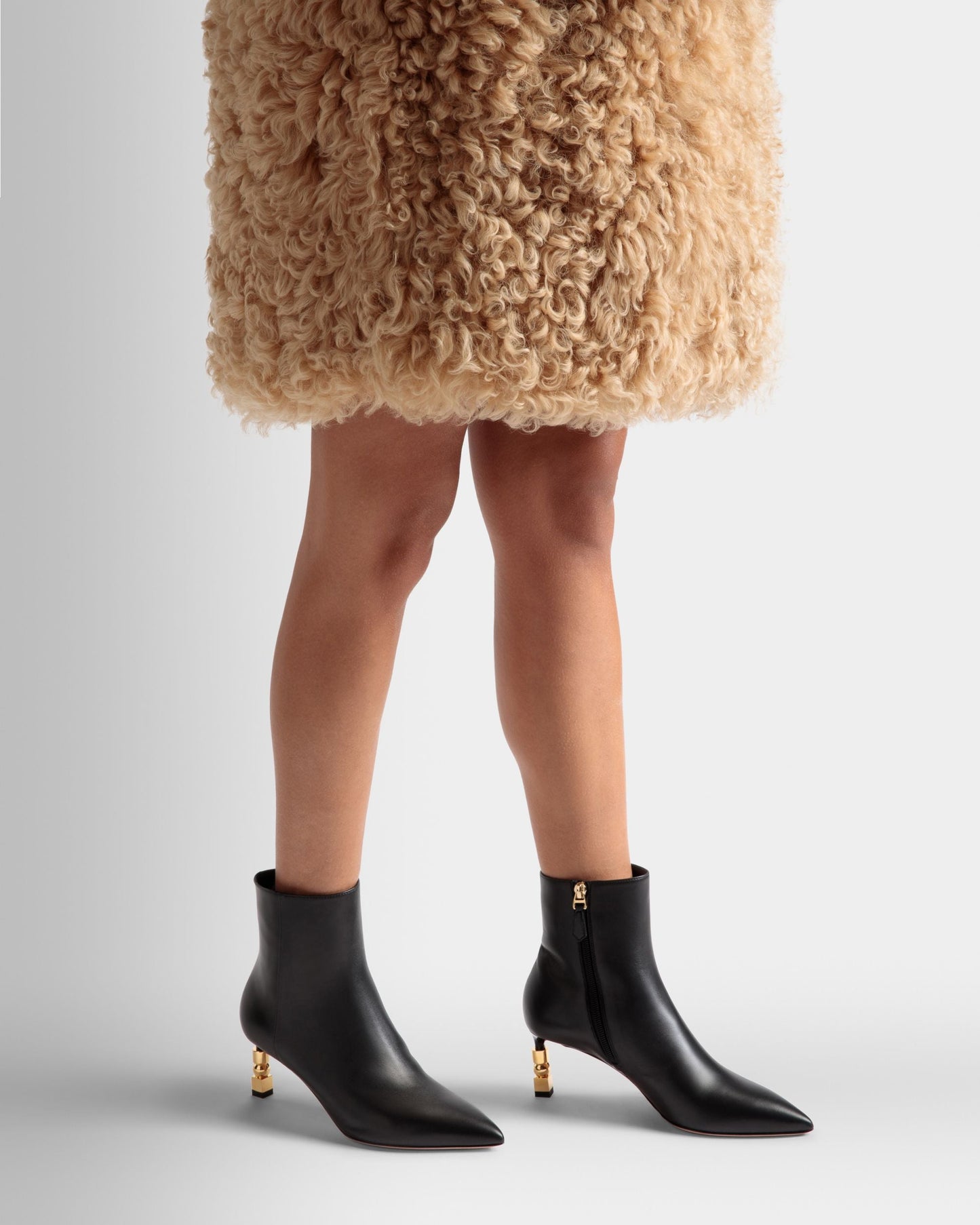 Helena 65 | Women's Booties | Black Leather | Bally | On Model Close Up
