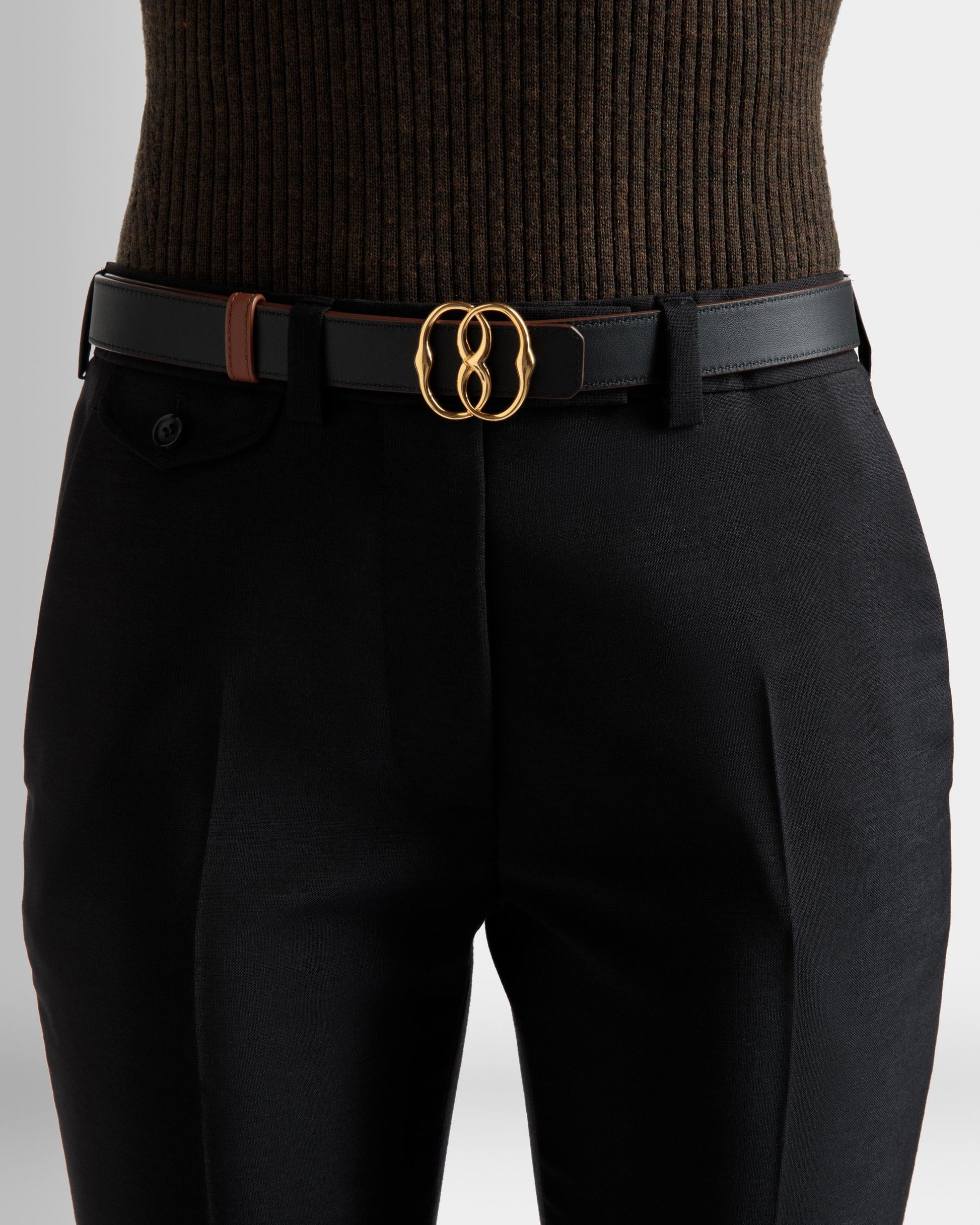 Emblem | Women's Fixed And Reversible Belt | Brown Leather | Bally | On Model Front