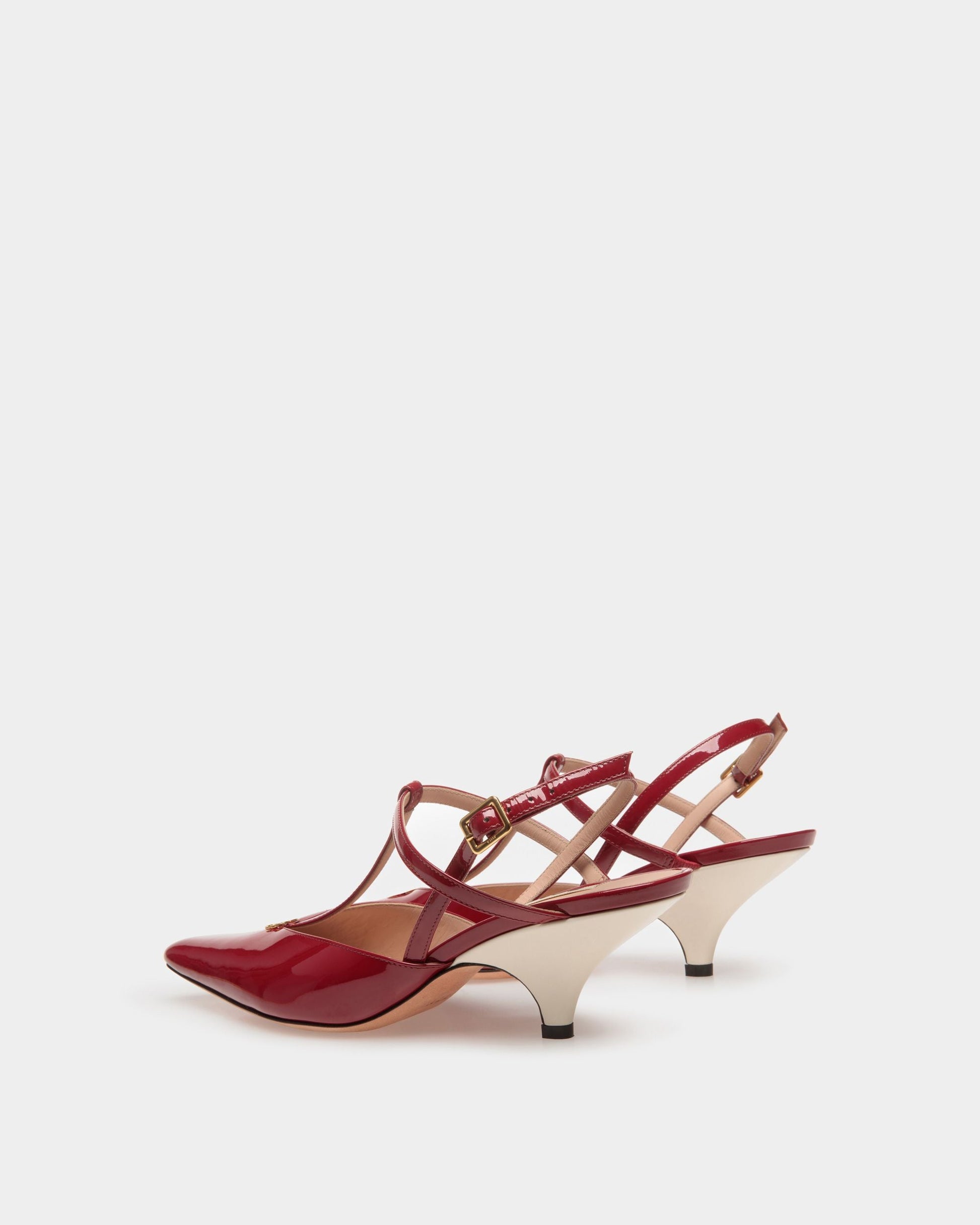 Karline | Women's Pumps | Ruby Red And Bone Leather | Bally | Still Life 3/4 Back