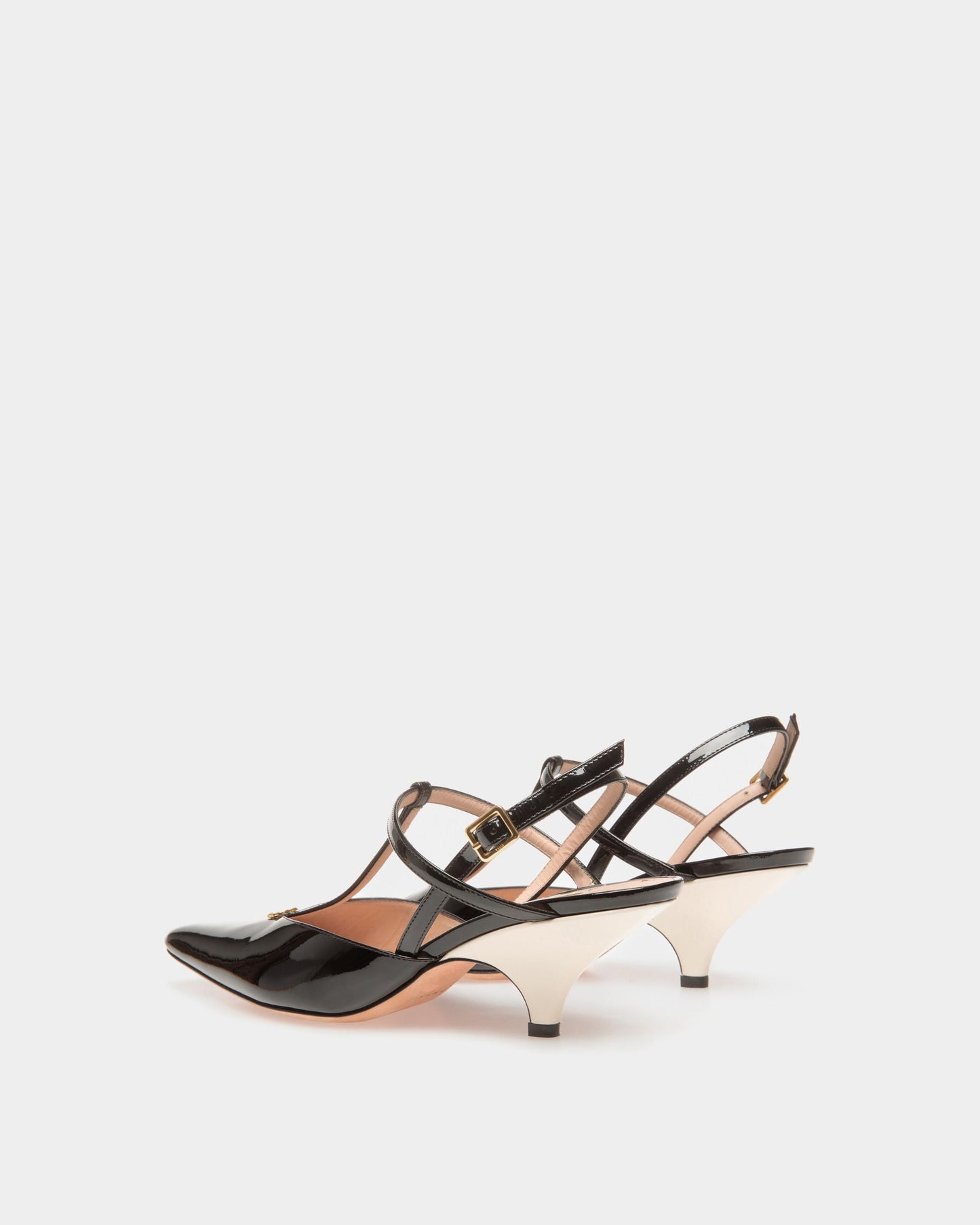 Karline | Women's Pumps | Black And Bone Leather | Bally | Still Life 3/4 Back