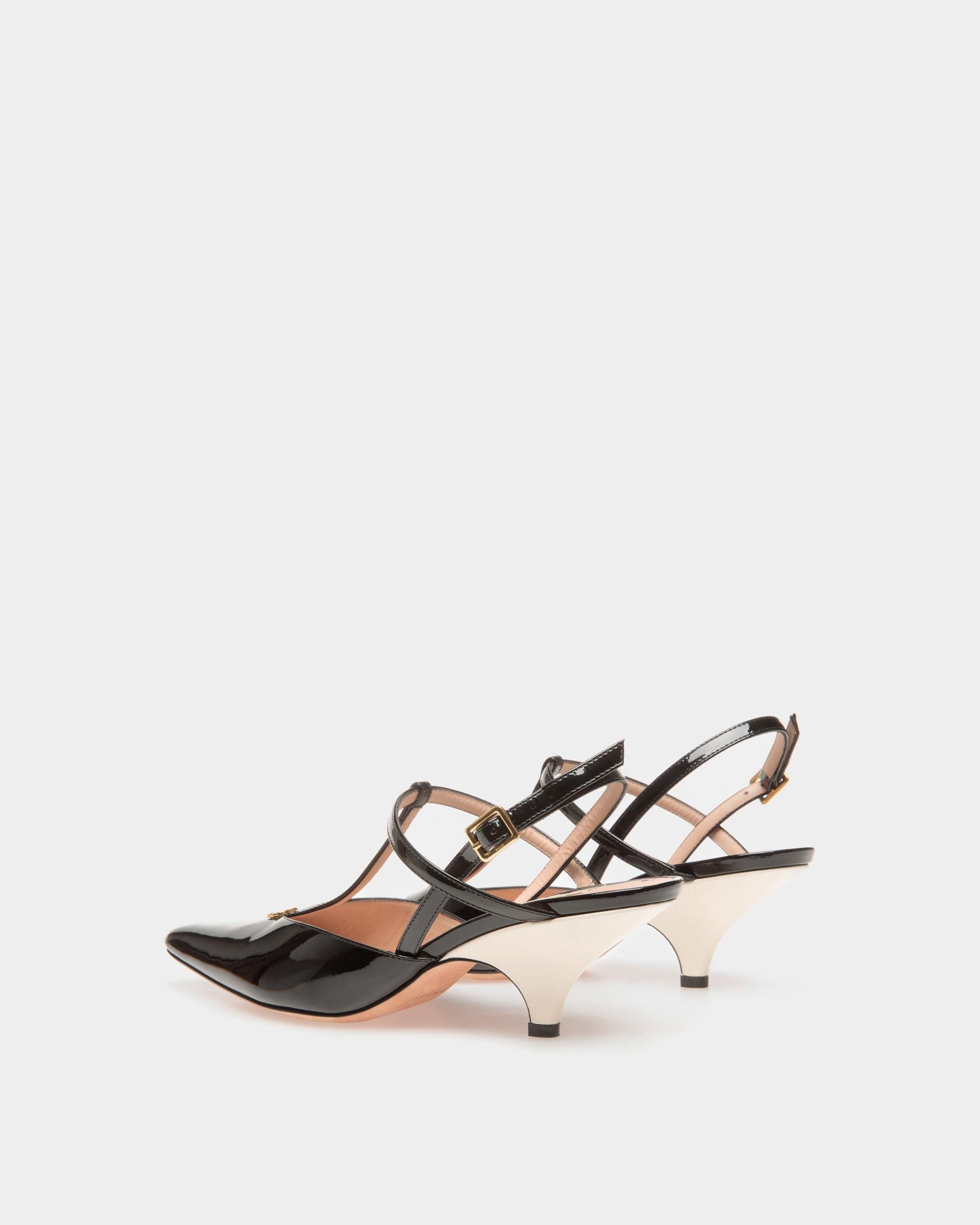 Karline | Women's Pumps | Black And Bone Leather | Bally | Still Life 3/4 Back